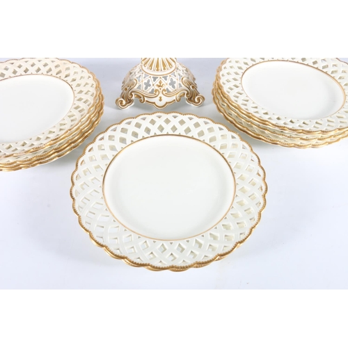 428 - 19th century porcelain dessert service with lattice borders. 