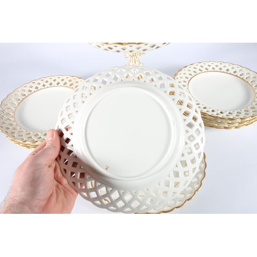 428 - 19th century porcelain dessert service with lattice borders. 