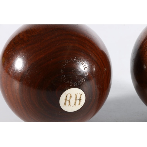 445 - Pair of Lawrie of Glasgow carpet bowls, 9.5cm diameter. 