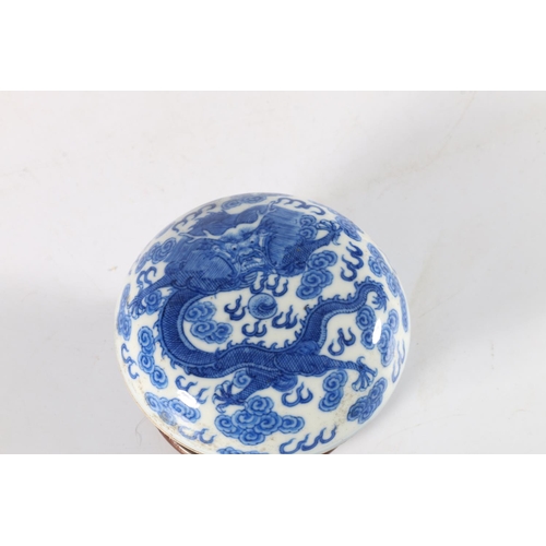 462 - Chinese blue and white circular box and cover decorated with Kylin dragon chasing a flaming pearl, 9... 