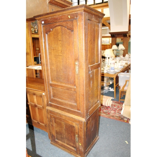 577 - Antique oak two section wardrobe.