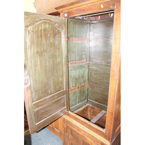 577 - Antique oak two section wardrobe.