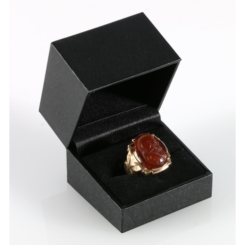 337 - Gents 10k gold ring set with carnelian oval stone with carved portrait of a Roman, ring size T, 7.2g... 