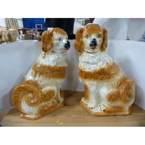 102 - Pair of pottery spaniel dogs (glass eyes lacking).