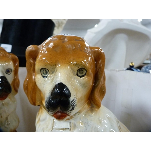 102 - Pair of pottery spaniel dogs (glass eyes lacking).