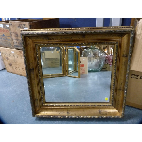 104 - Gilt tri-plate dressing mirror and a gilt wall mirror.