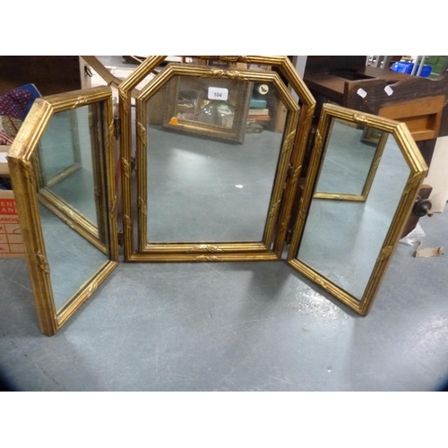 104 - Gilt tri-plate dressing mirror and a gilt wall mirror.