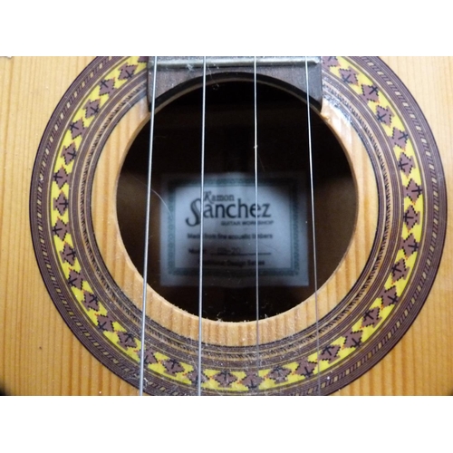 108 - Lorenzo Model N16X acoustic guitar and a Ramon Sanchez steel-strung ukulele.  (2)