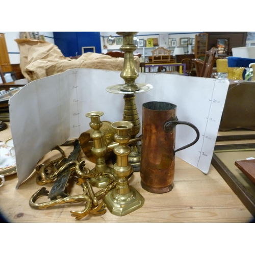 112 - Group of antique and later brass and copper to include candlesticks, watering can, brackets, copper ... 