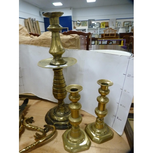 112 - Group of antique and later brass and copper to include candlesticks, watering can, brackets, copper ... 