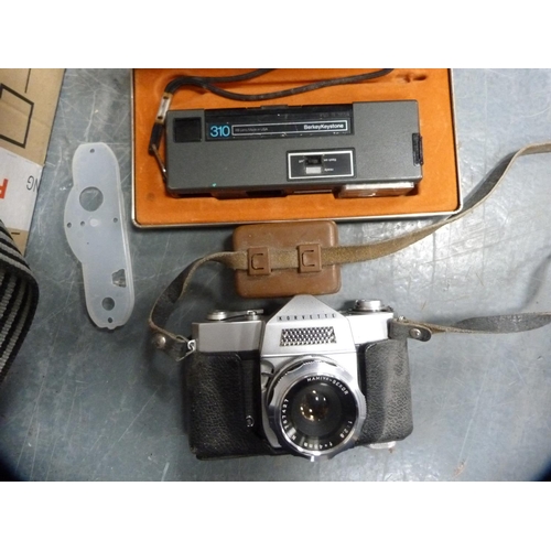 14 - Carton containing cameras and accessories to include a Cosina C1S camera with lens, JVC video camera... 