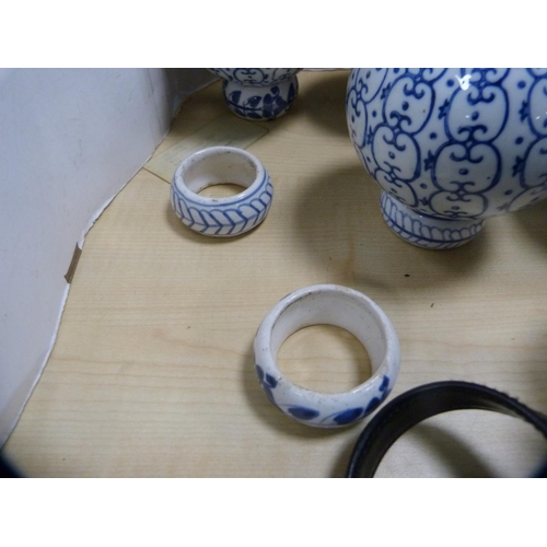 147 - Collection of eight blue and white ceramic bowls with napkin ring stands.