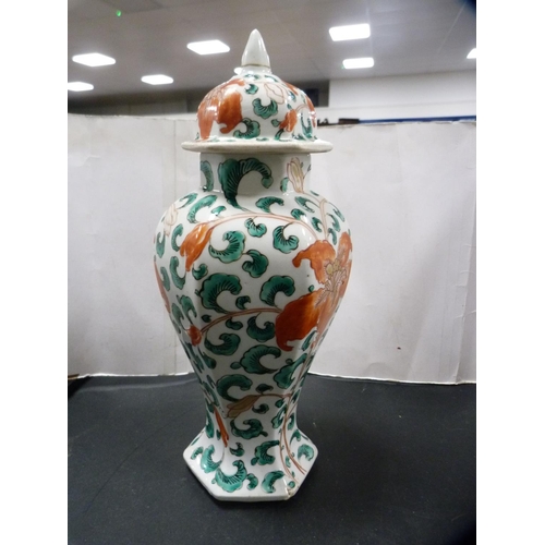 157 - Chinese-style octagonal vase and cover with famille verte decoration.