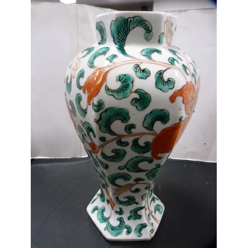 157 - Chinese-style octagonal vase and cover with famille verte decoration.