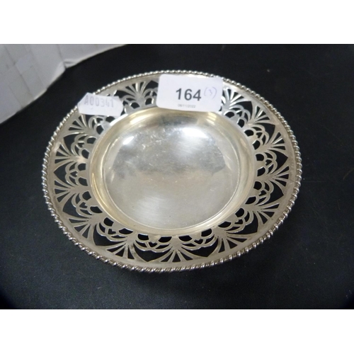 164 - Small silver pierced bowl, monogrammed coaster and a compact, 129.5 gross.  (3)