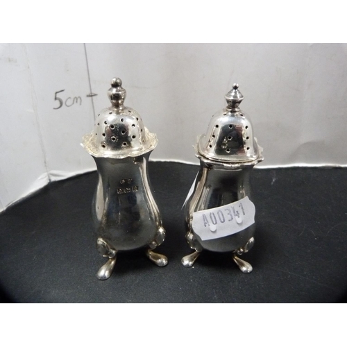 165 - Silver condiments to include mustard pots with blue glass liners, pair of silver pepper pots etc., 1... 