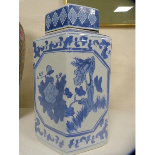 229 - Reproduction Chinese Canton famille rose vase and a reproduction Chinese blue and white octagonal va... 