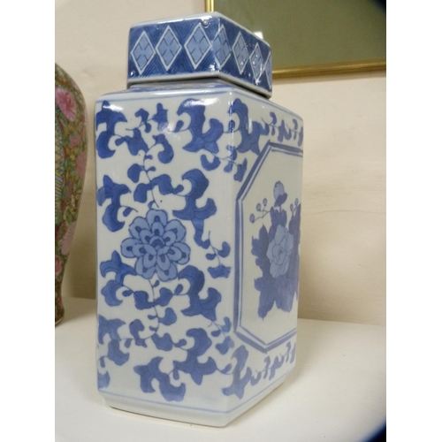 229 - Reproduction Chinese Canton famille rose vase and a reproduction Chinese blue and white octagonal va... 