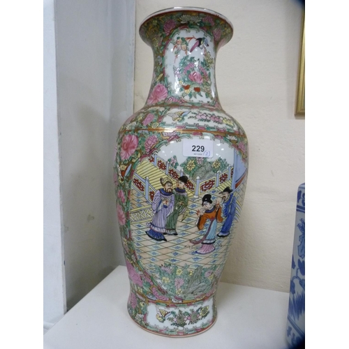 229 - Reproduction Chinese Canton famille rose vase and a reproduction Chinese blue and white octagonal va... 