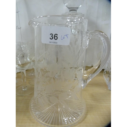 36 - Group of crystal and glass to include two decanters and stoppers, Edwardian etched glass water jug d... 