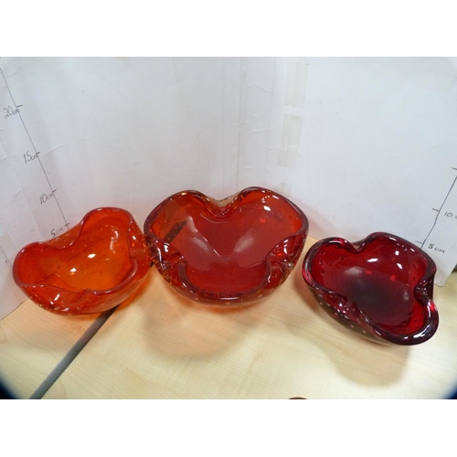 5 - Group of coloured art glass to include bowls and dishes.