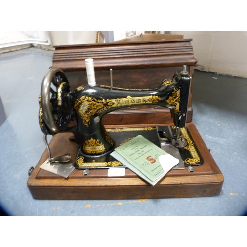 81 - Singer portable sewing machine, cased.