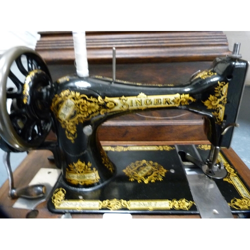 81 - Singer portable sewing machine, cased.