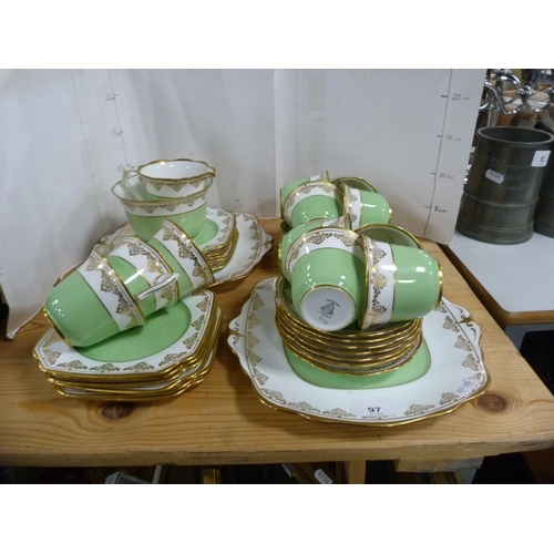 97 - Bell China green and gilt part tea set.