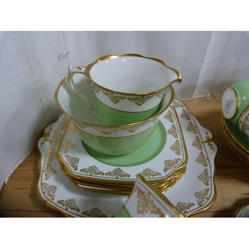 97 - Bell China green and gilt part tea set.