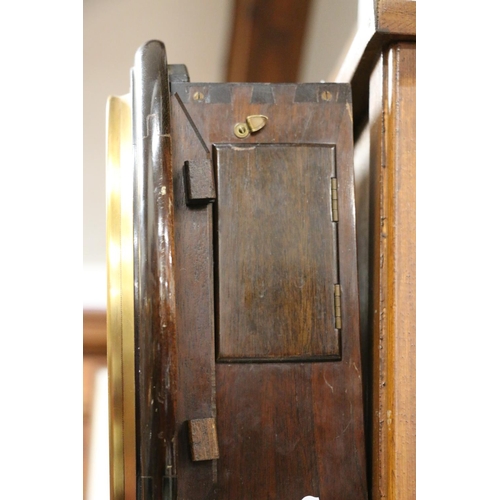 309 - Antique mahogany fusee bulkhead wall clock, the dial with Roman numerals, 38cm diameter.