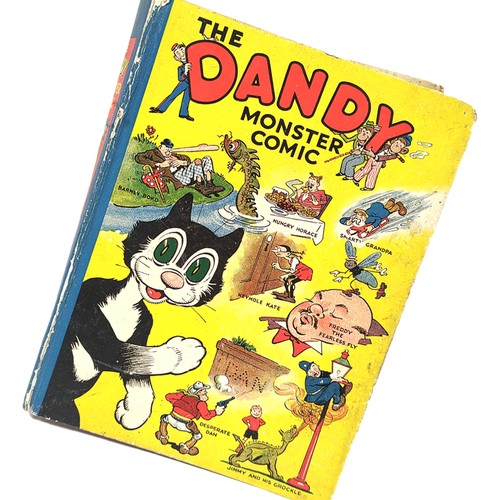 First Edition The Dandy Monster Comic 1938, annual published by D. C. Thomson & Co Ltd London, Manchester and Dundee, pictorial front board depicting Korky The Cat. blue spine and plain backboard, inside caption reads 'To Ronald from Auntie Gladys Xmas 1938'.