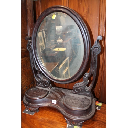 580 - Mahogany cased toilet mirror.