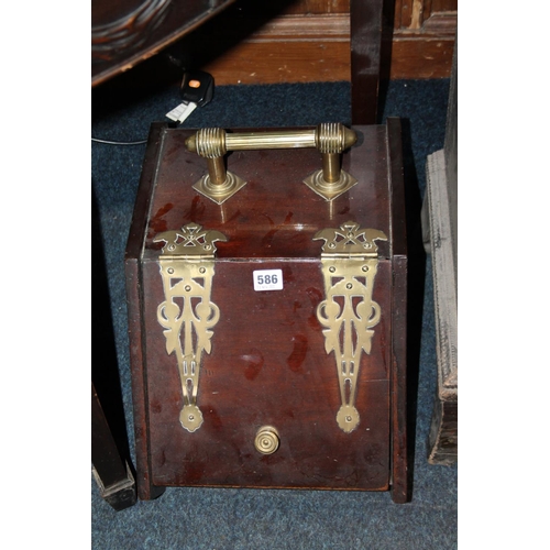 586 - Antique mahogany and brass coal scuttle.