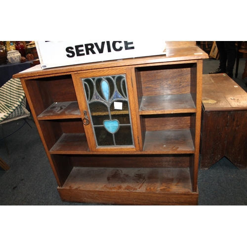 596 - Oak gallery backed open front bookcase, with central stained glass panel door, 98cm high.