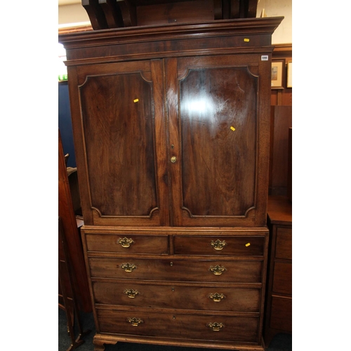 598 - Victorian mahogany linen press, the two panelled door top above chest of two short over three long d... 