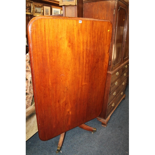 600 - Victorian mahogany tilt-top breakfast table, raised on quadripartite base, 135cm x 99cm.