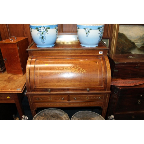 607 - Mahogany and inlaid roll top / cylinder desk, with brass gallery, raised on square tapering supports... 