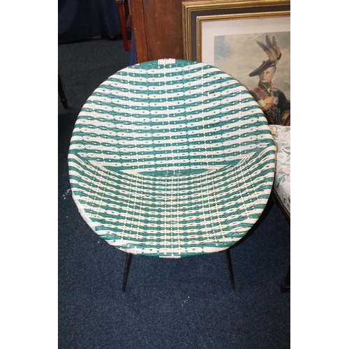 634 - Terence Conran green and white wicker tub chair, on spindle metal leg supports.