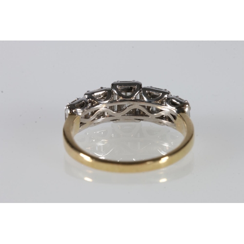 100A - 18K gold baguette cut diamond set ring, size Q,  4.3g, unhallmarked.