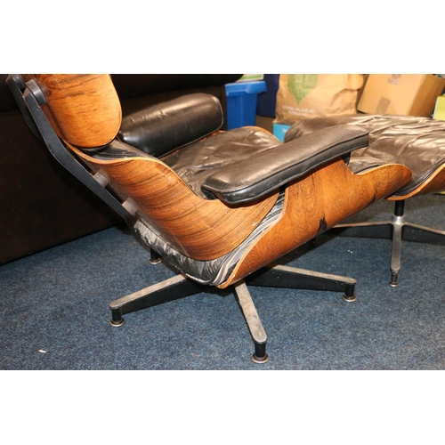 636 - Charles & Ray Eames style lounge chair and swivel footstool.