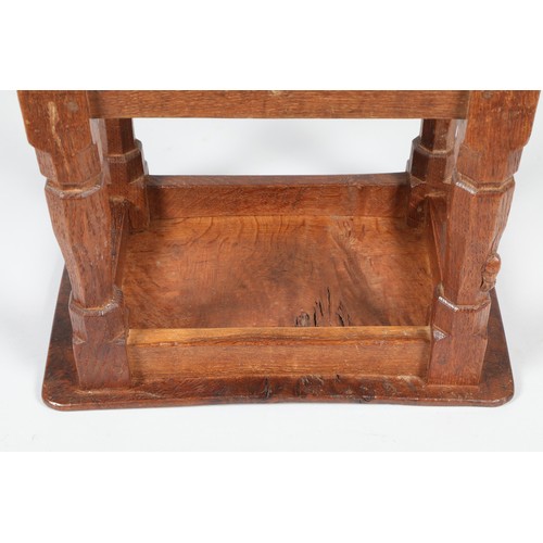 452 - Robert Mouseman of Kilburn oak stool, the adzed saddle seat on octagonal chamfered legs united by pl... 