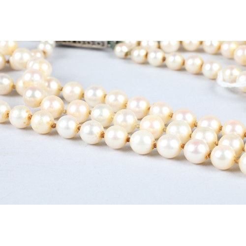 116 - Ladies double strand pearl necklace, with white metal diamond set clasp, 0.33 carats