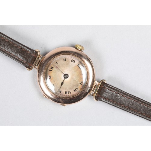 128a - Early ladies 9 carat gold Rolex wristwatch, plain dial with black hands and Roman numerals, 15 jewel... 