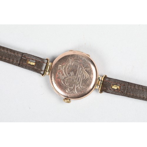 128a - Early ladies 9 carat gold Rolex wristwatch, plain dial with black hands and Roman numerals, 15 jewel... 