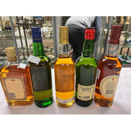 223 - Eight assorted bottles of whisky, two bottles of port and a cognac including: Bells blended scotch w... 