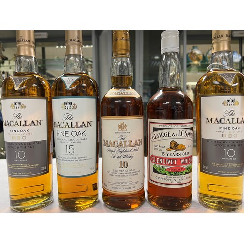 232 - Ten assorted bottles of Whisky including: 15 year Macallan Fine Oak Highland single malt scotch whis... 