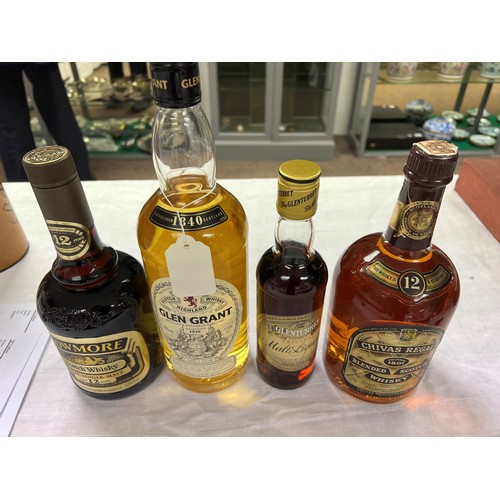 228 - Five assorted bottles of whisky including: 12 year old Chivas Regal Blended scotch whisky, 43% vol, ... 