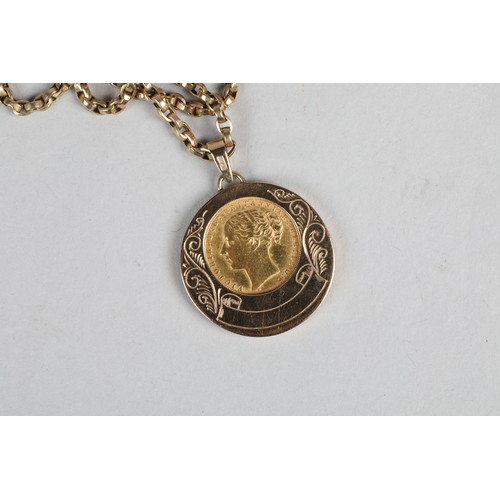 129 - A Victorian 1871 gold sovereign, mounted to a 9 carat gold circular pendant with a 9 carat gold chai... 