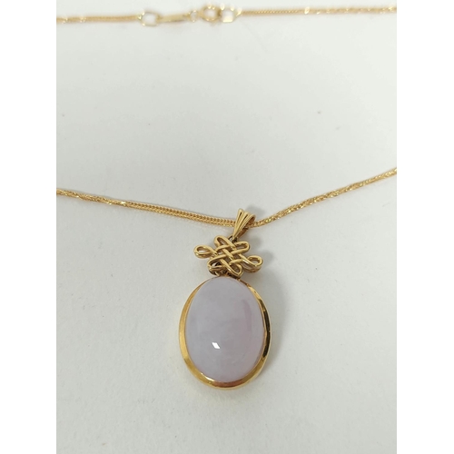 151 - Jadeite pendant with oval pale lilac cabochon, in gold '750. 