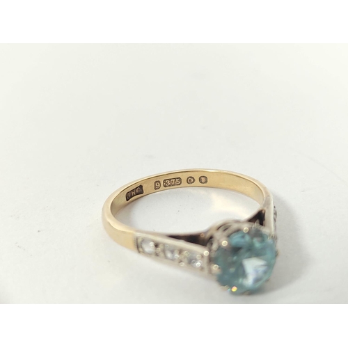 153 - Blue zircon ring and another and an opal set pin, all 9ct gold. (3).  